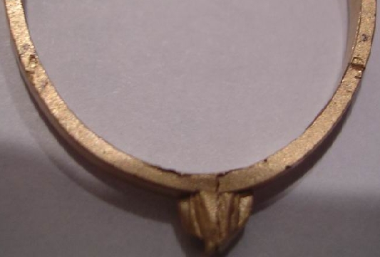 How do defects on the casts appear when caused by some bubbles entrapped into the wax?